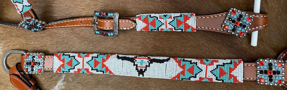 Showman 4pc. Longhorn beaded one headstall and breast collar set with square bling concho accents. Comes with Wither strap and competition reins #3